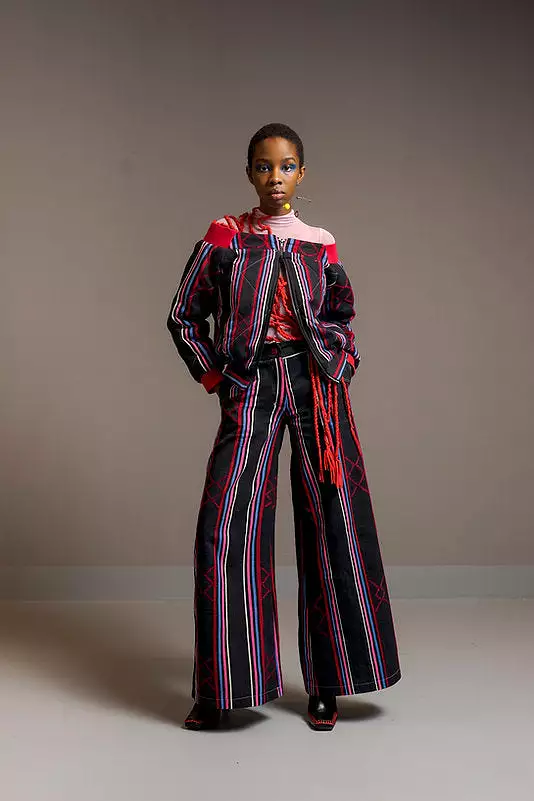 Kardascian- off-Shoulder kilted Bomber Jacket in Kente