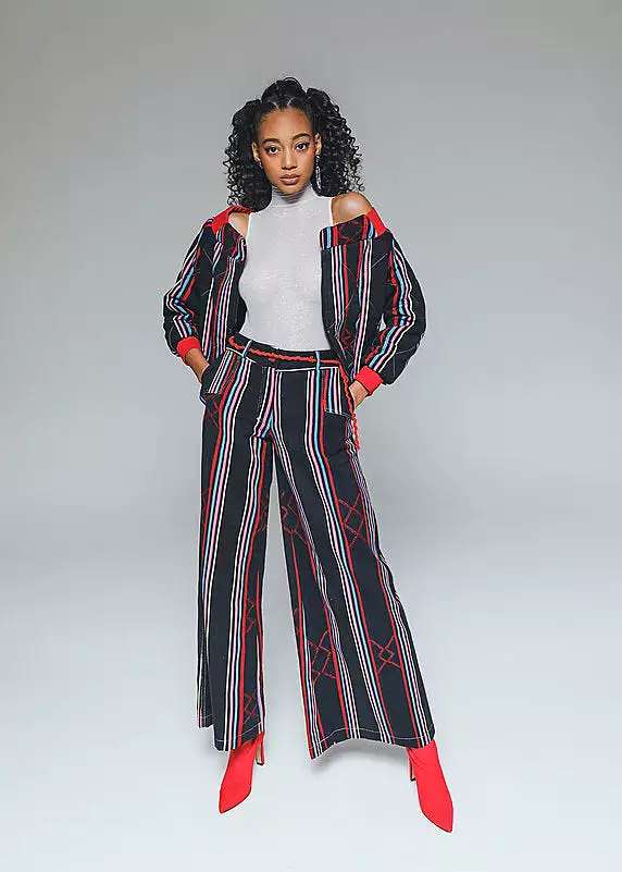 Kardascian- off-Shoulder kilted Bomber Jacket in Kente