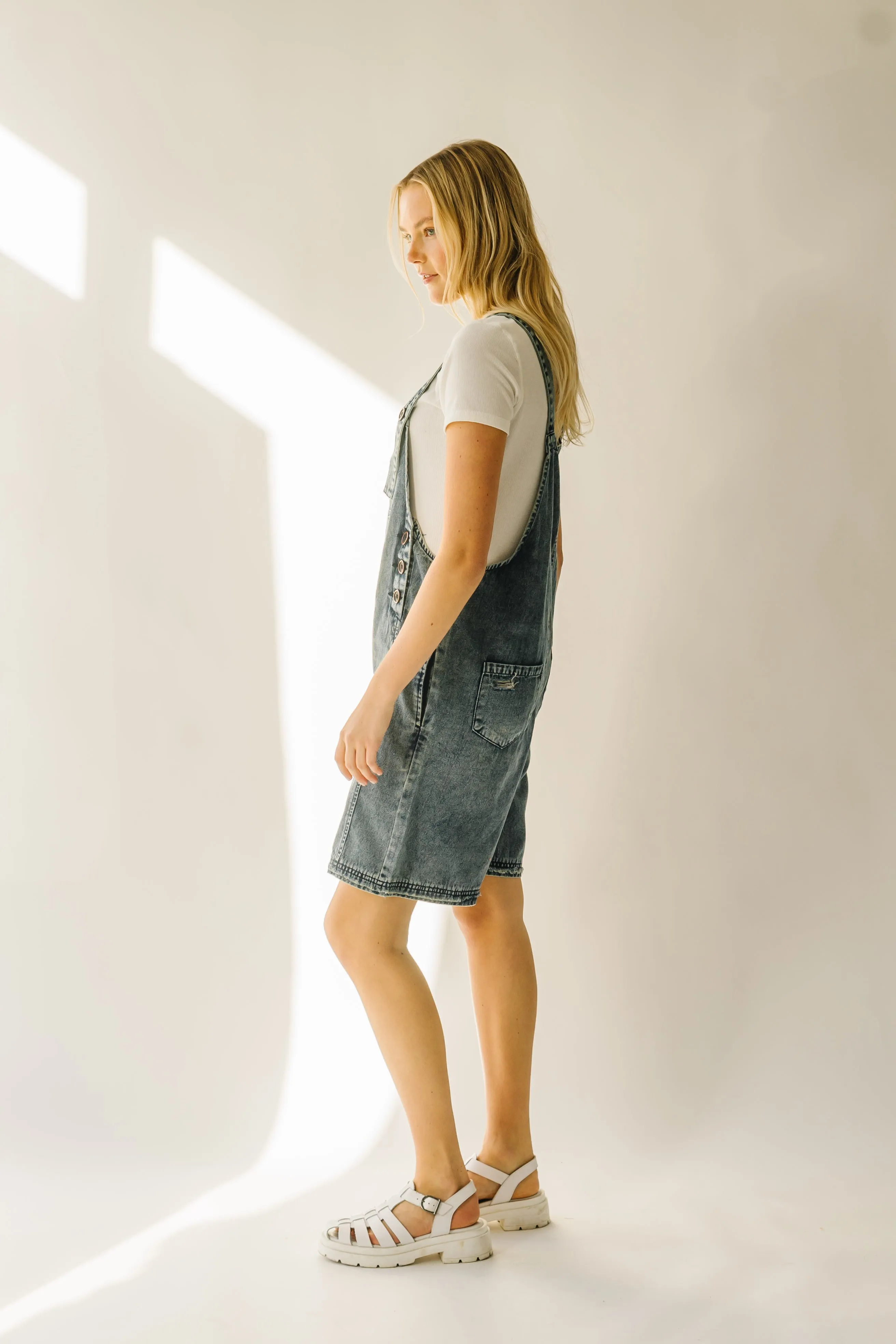 The Dearing Washed Denim Shorts Romper in Vintage Denim